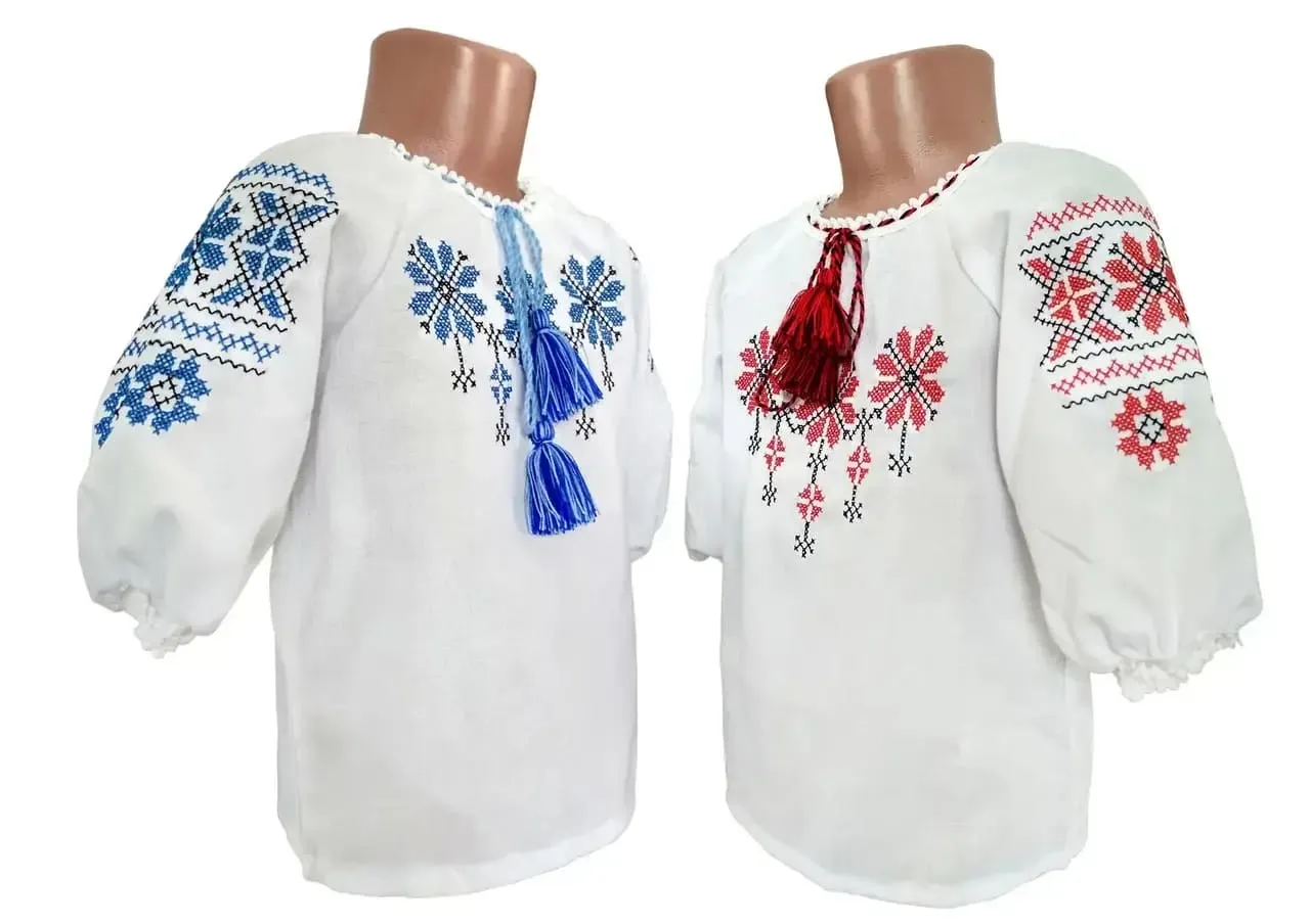 Embroidered blouse for a girl with a geometric ornament